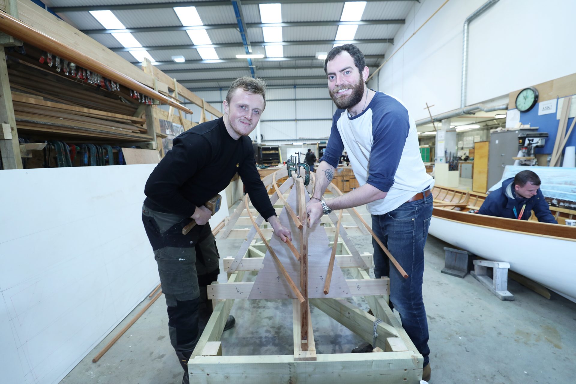 Falmouth Marine School boatbuilding students at work in the Ponshardon boat yard